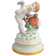 Cupid knocking on a heart, Coloured with gold, H 17 cm