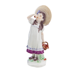 Figurine of a "Girl with cherries", H 17 cm