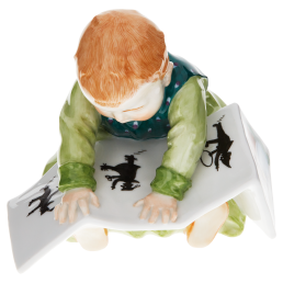 Child sitting with book, Coloured, without gold, H 10 cm